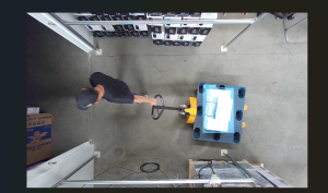 Forklift transporting a pallet of boxes through the 3D vision detection area of Vi LiDAR Technology's intelligent pallet box counting system.