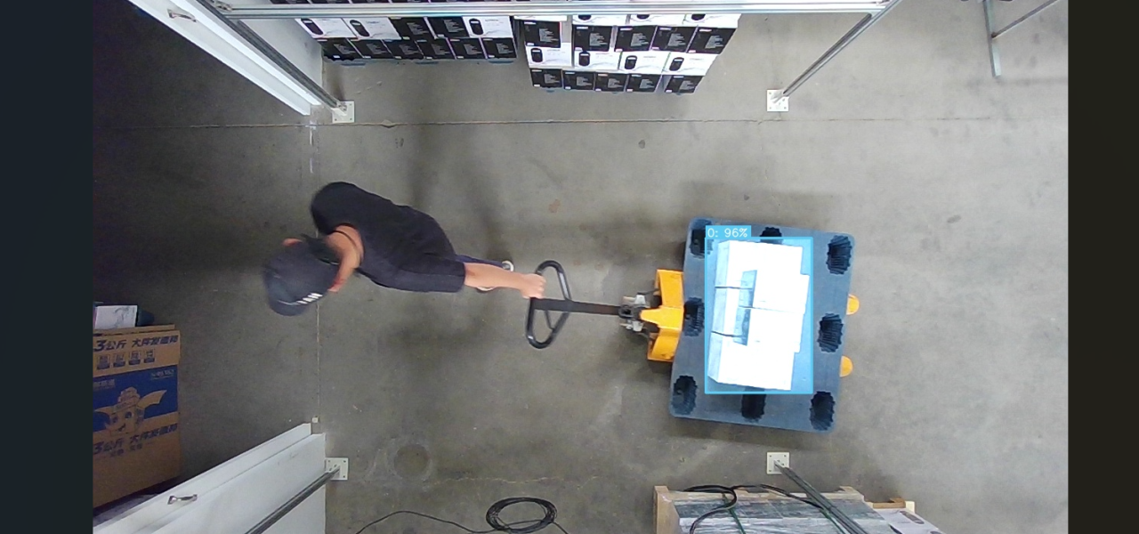 Forklift transporting a pallet of boxes through the 3D vision detection area of Vi LiDAR Technology's intelligent pallet box counting system.